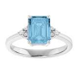 Sterling Silver Natural Sky Blue Topaz  and 1/10 CTW Lab-Grown Diamond Ring